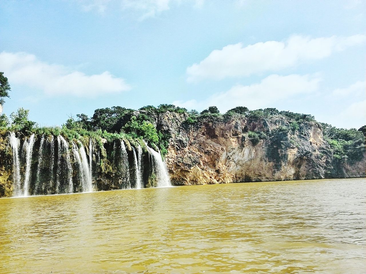 SCENIC VIEW OF WATERFALL