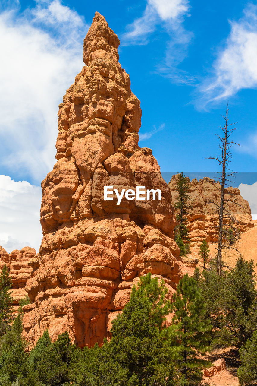 LOW ANGLE VIEW OF ROCK FORMATIONS