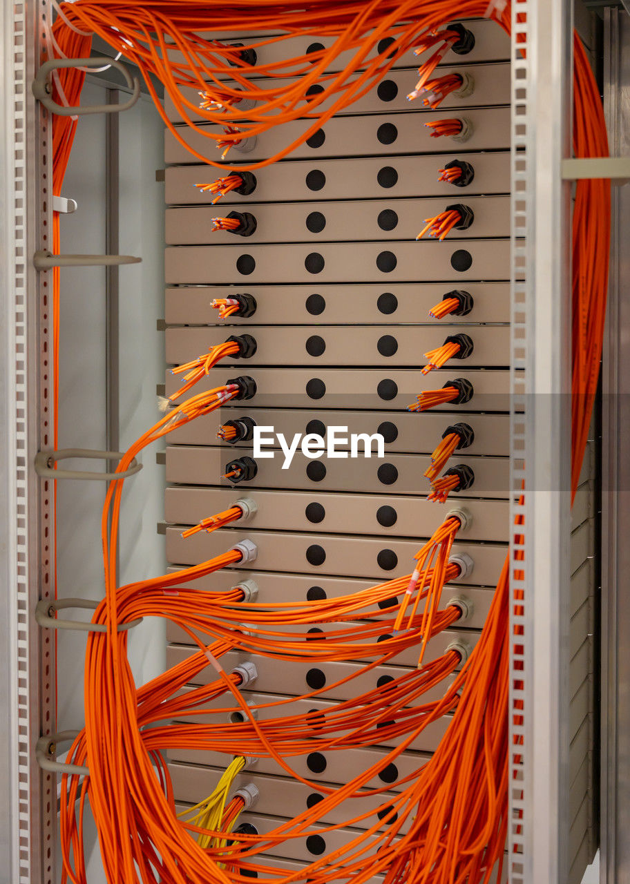 cable, technology, internet, electrical wiring, computer network, network server, computer cable, communication, computer, network connection plug, wireless technology, electricity, equipment, electronics industry, electrical supply, business, computer equipment, no people, indoors, complexity, power supply, electrical equipment, industry, office, wire, telecommunications equipment