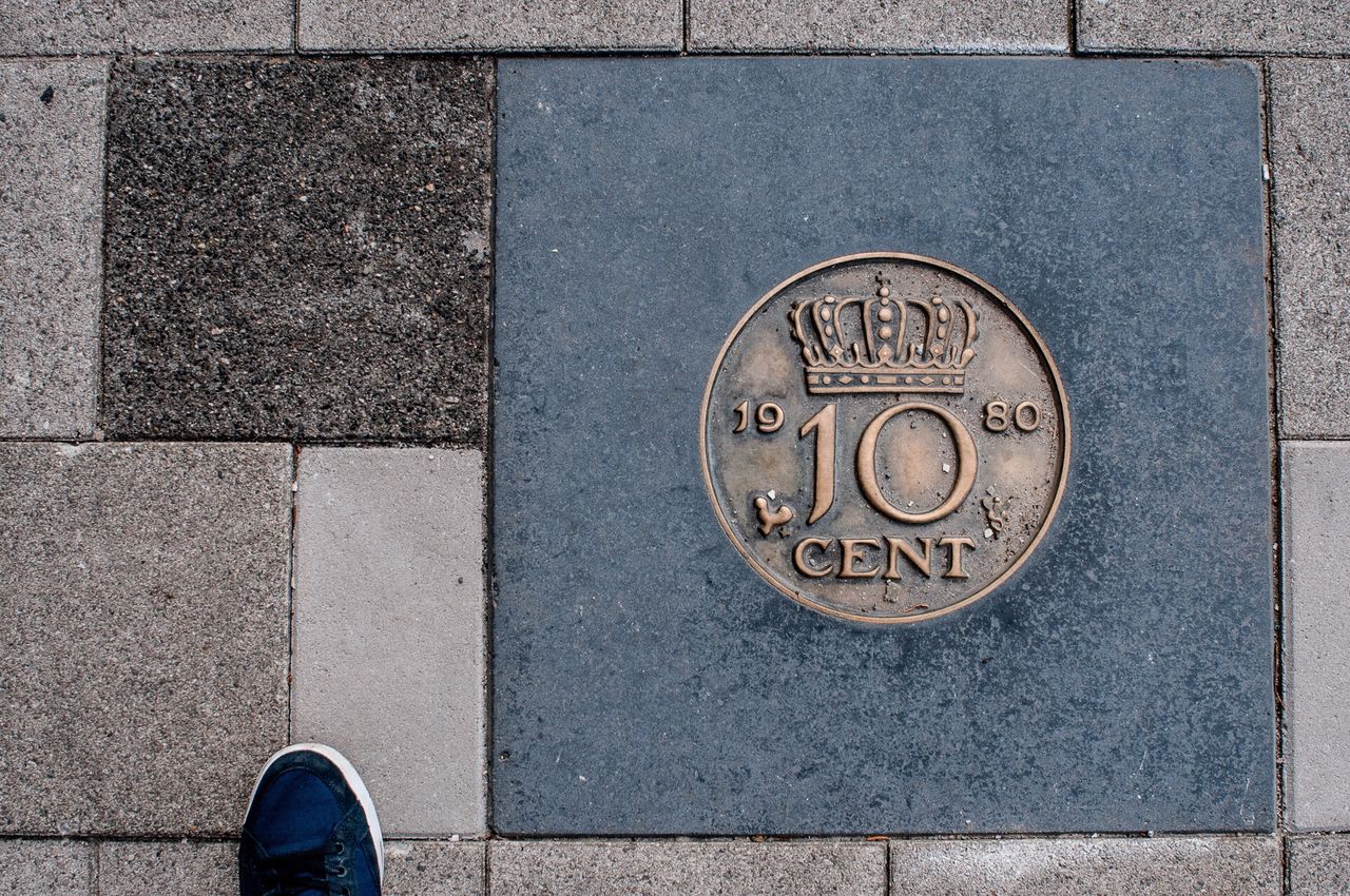 Coin carved on street