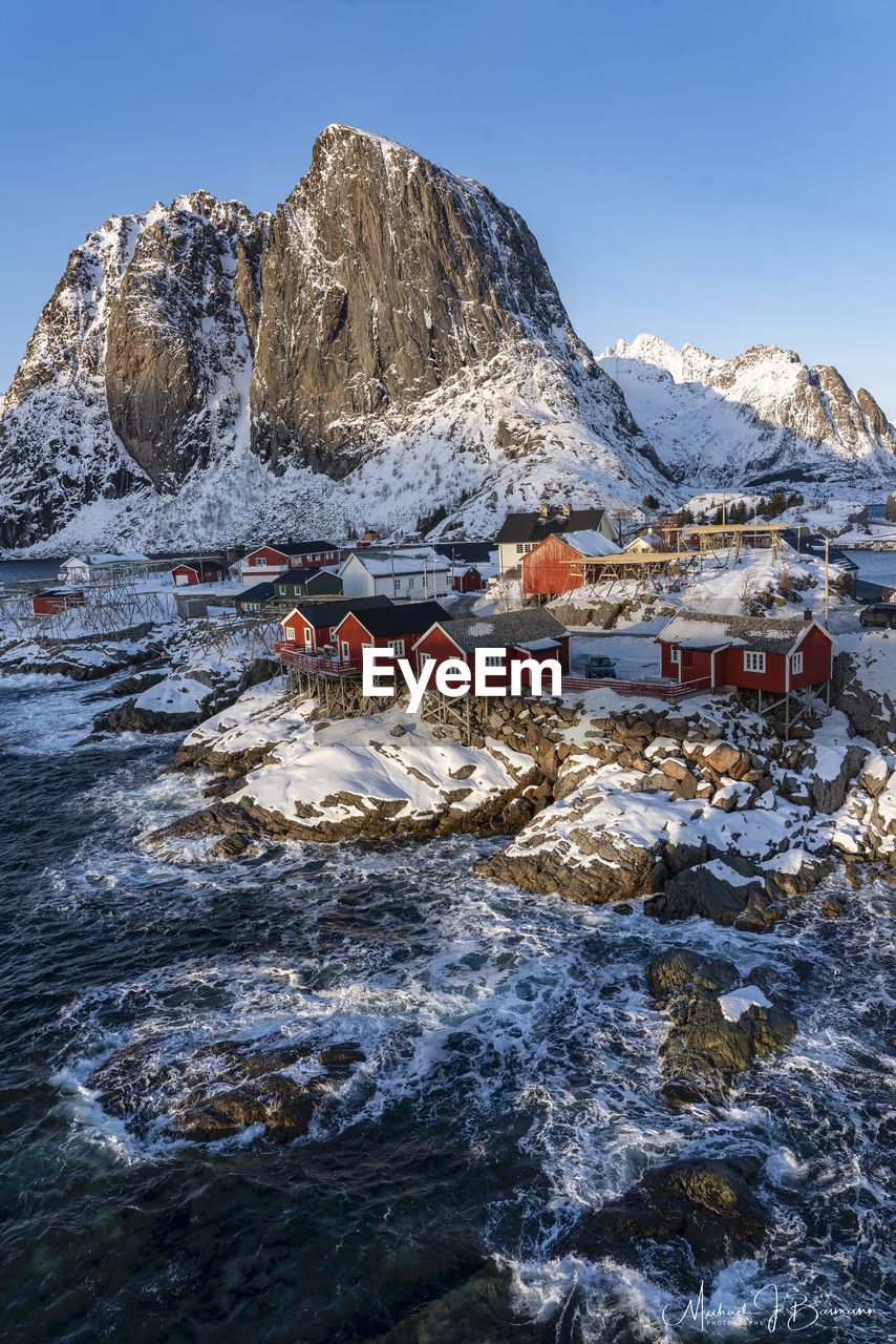 Scenic view of snowcapped mountains against sky reine nirway