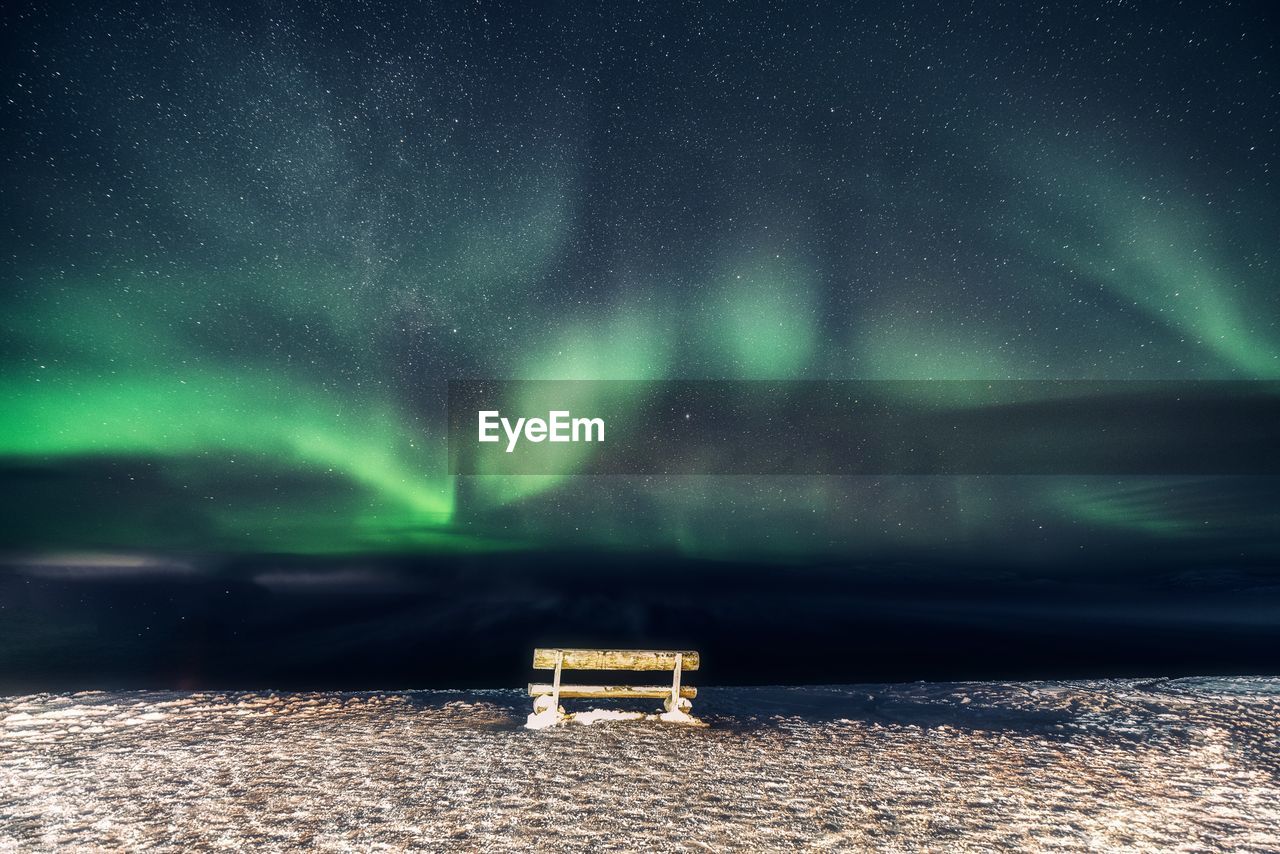 Scenic view of sea against sky at night