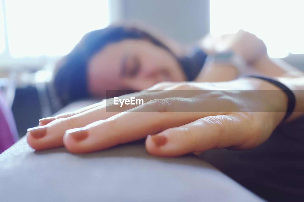 Close-up of smiling woman at home