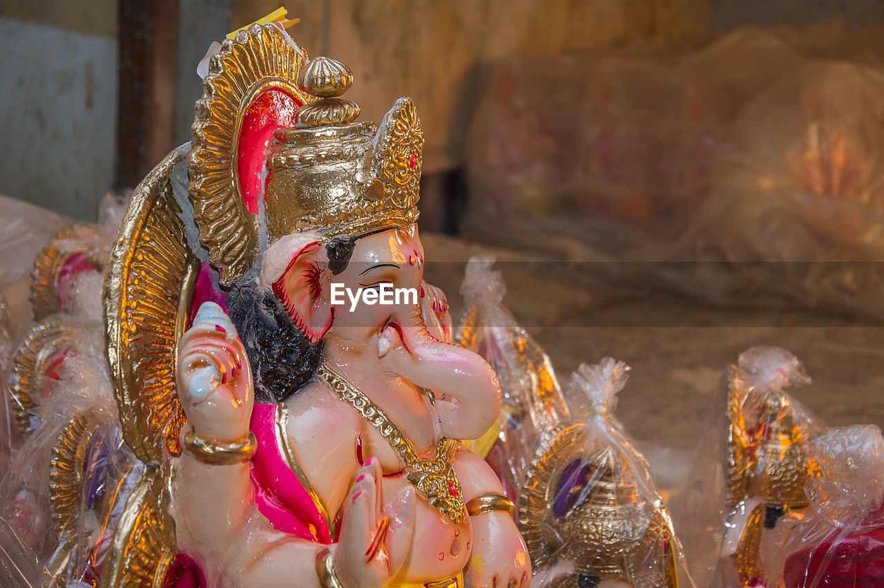Close-up of ganesha idols