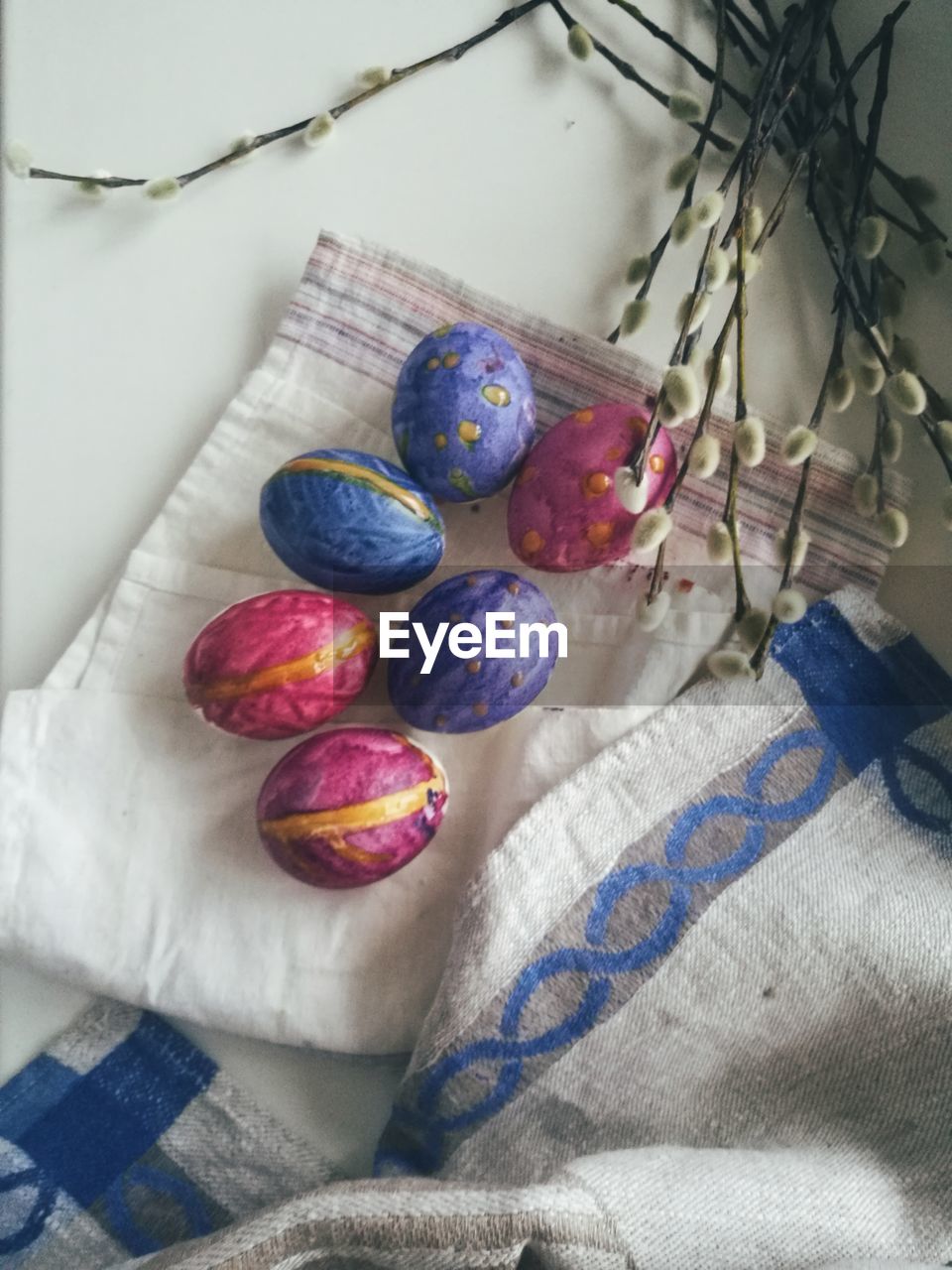 Close-up of multi colored eggs on table