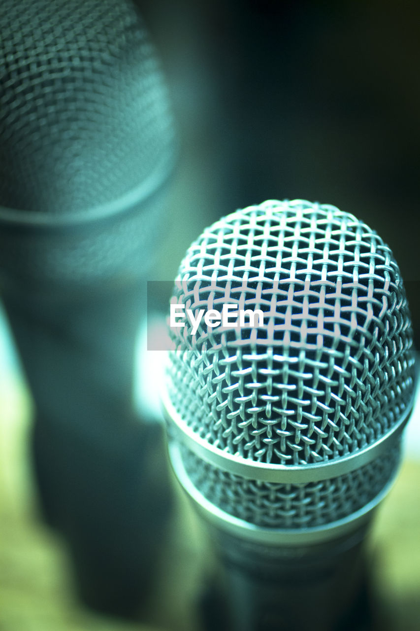 Close-up of microphones at studio
