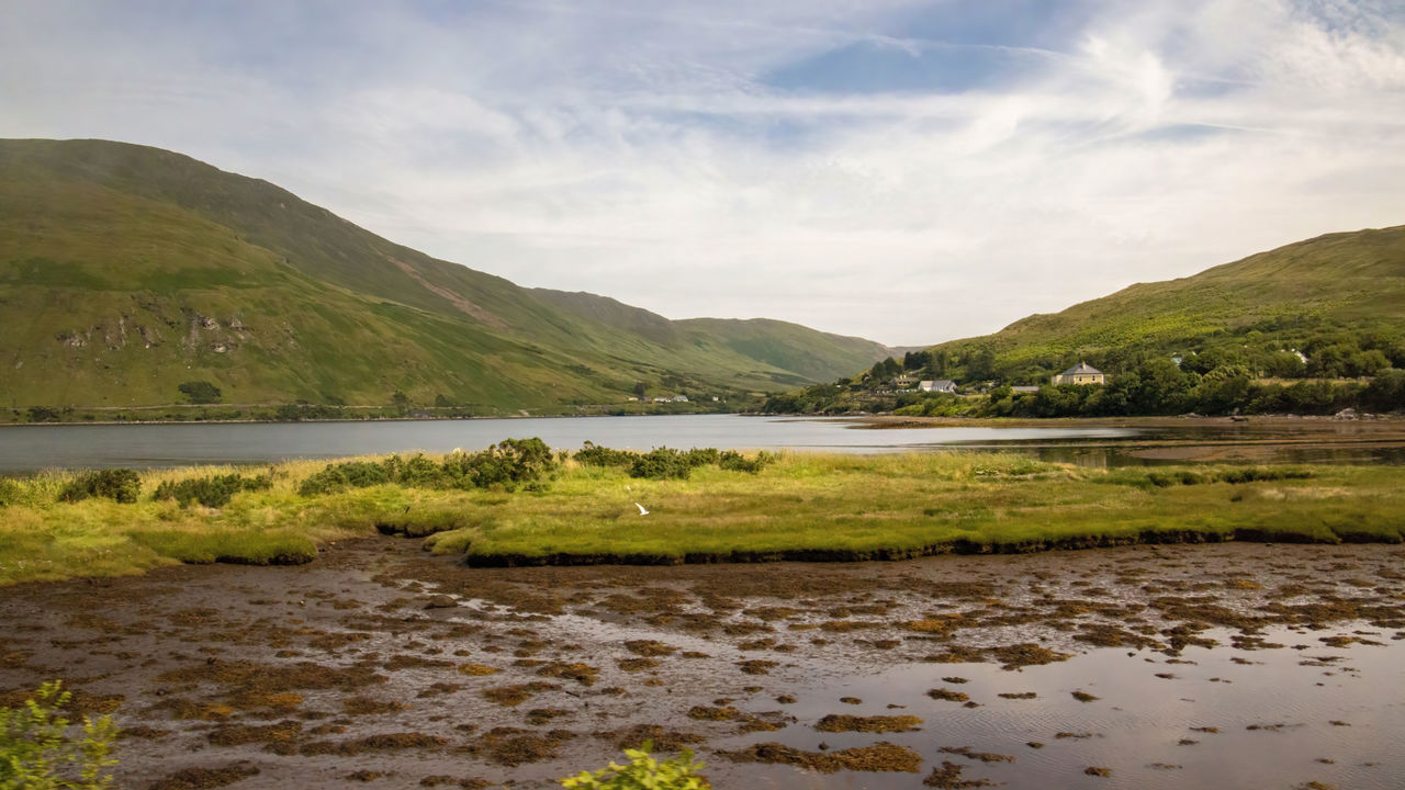 Scenic view of lake and mountains against sky - connemara national parl