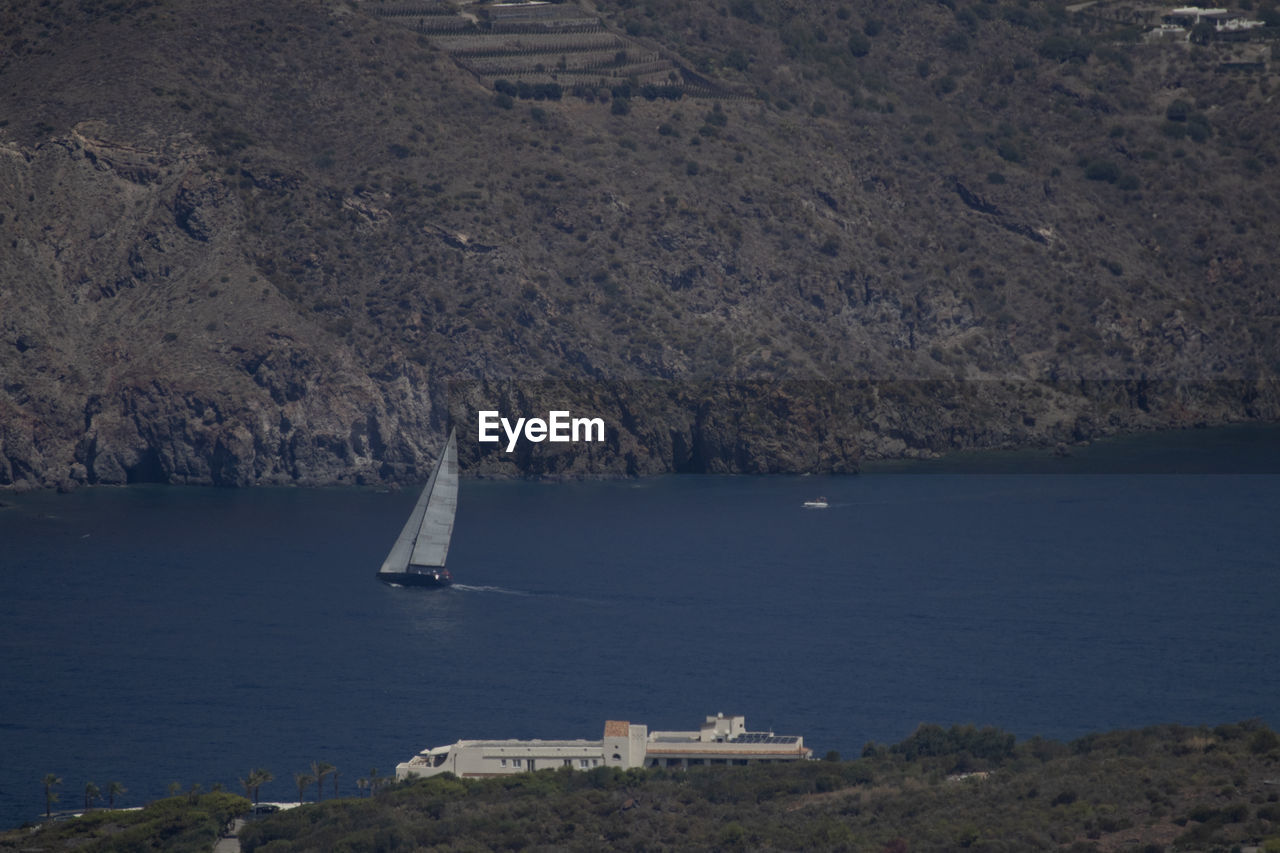 SCENIC VIEW OF SAILBOAT ON SEA