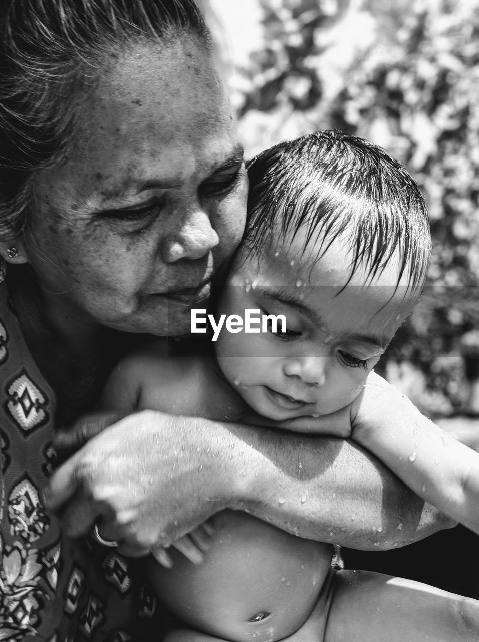 Close-up of mature woman with toddler boy