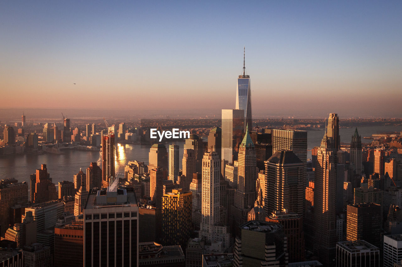 Sunset over manhattan and the financial district, new york city, ny