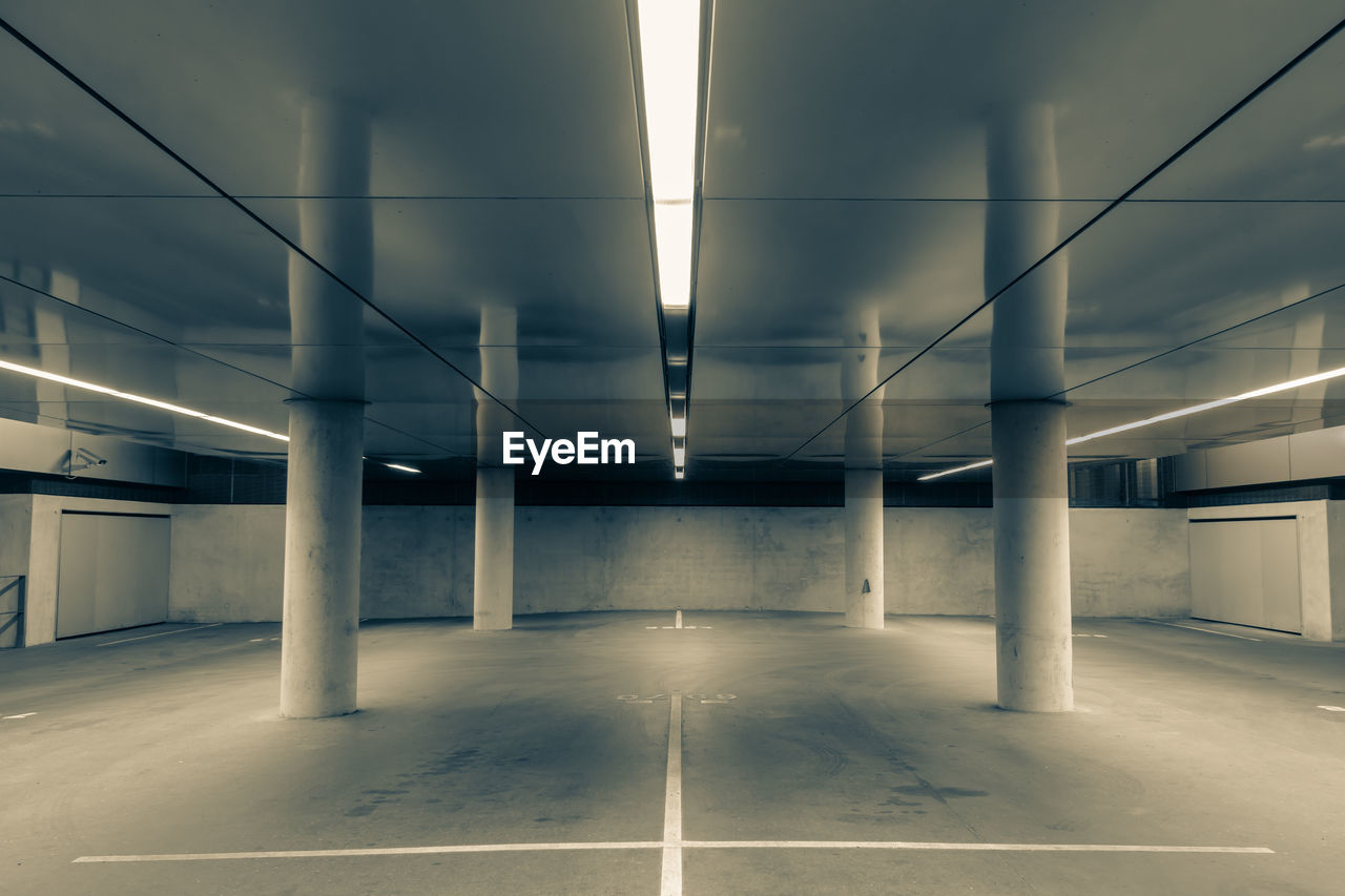 Parking garage architecture in monochrome at night 