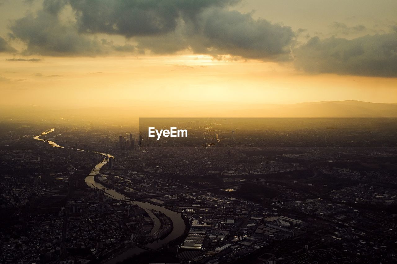 Aerial view of cityscape at sunset