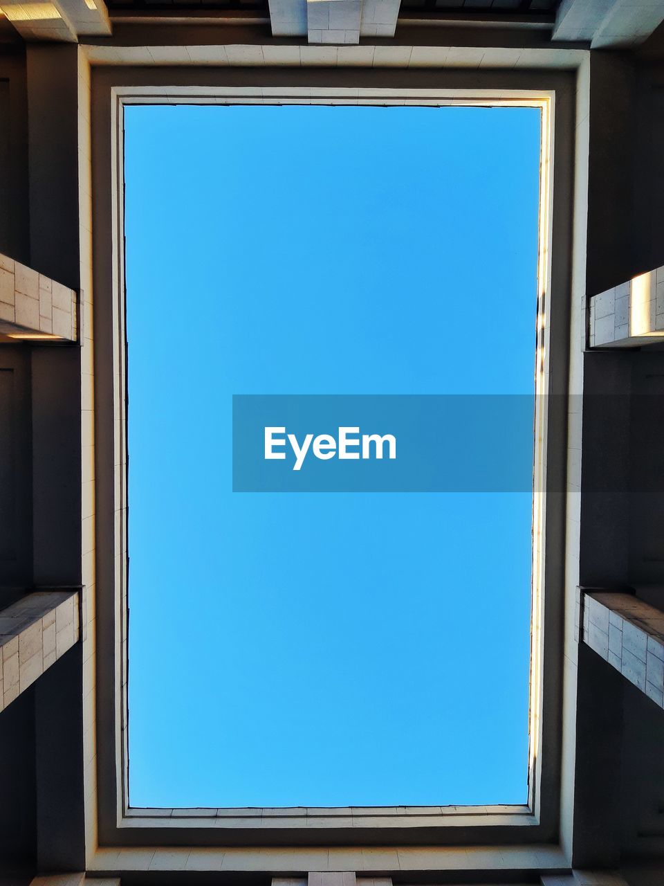 Low angle view of building against blue sky