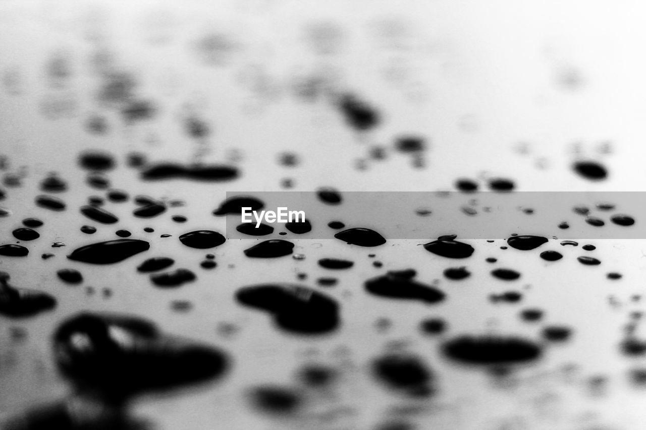 Close-up of water drops on table