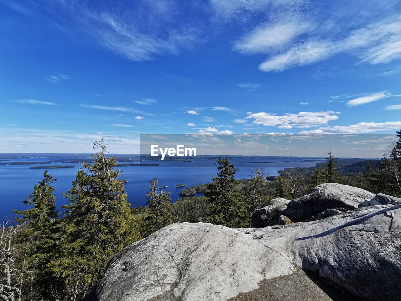 Scenic view of sea against blue sky