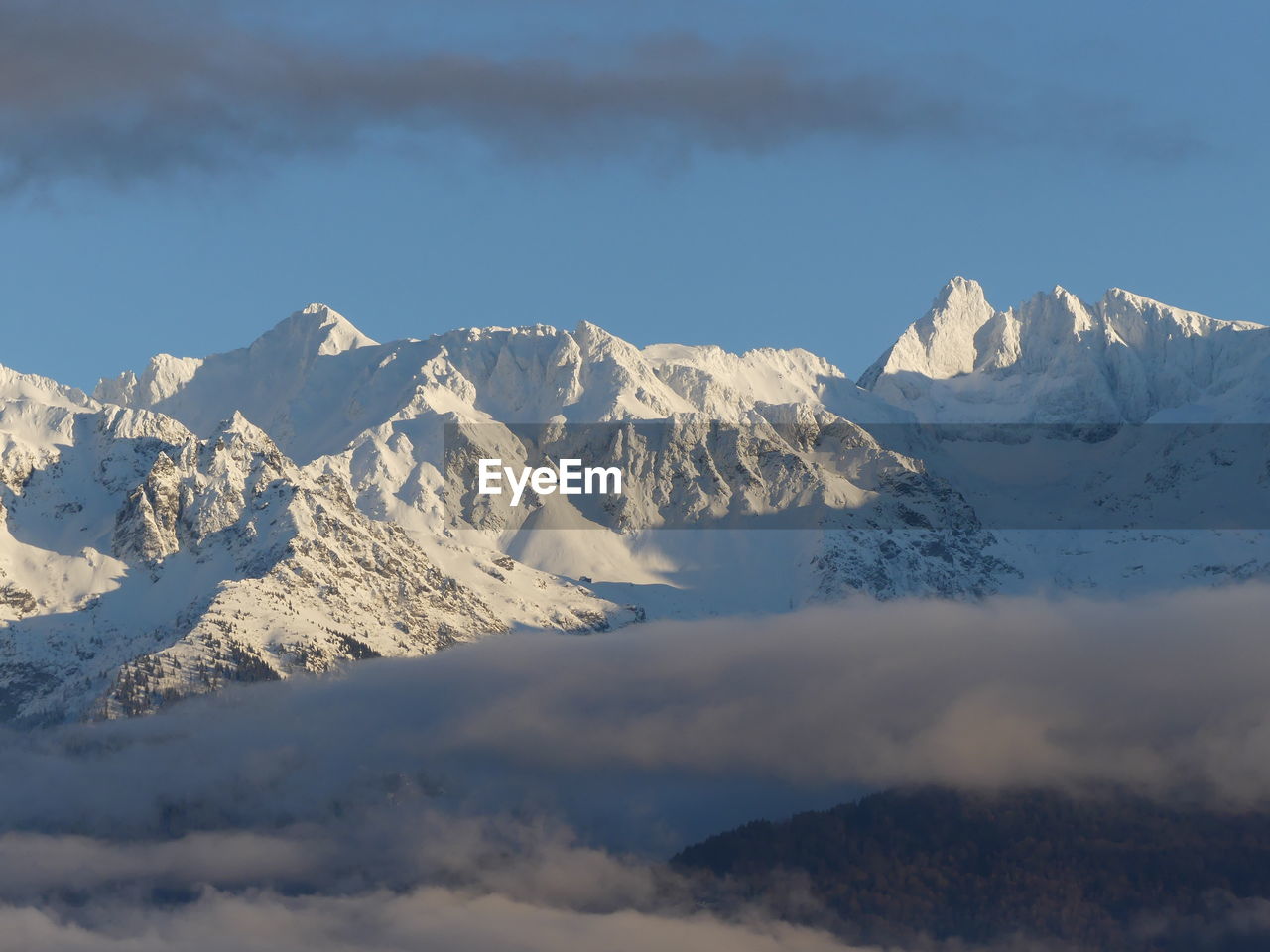 SNOWCAPPED MOUNTAINS AGAINST SKY