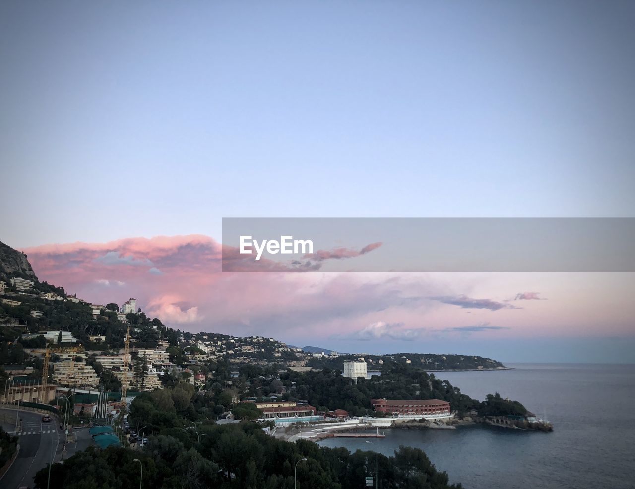 Scenic view of sea against sky at sunset