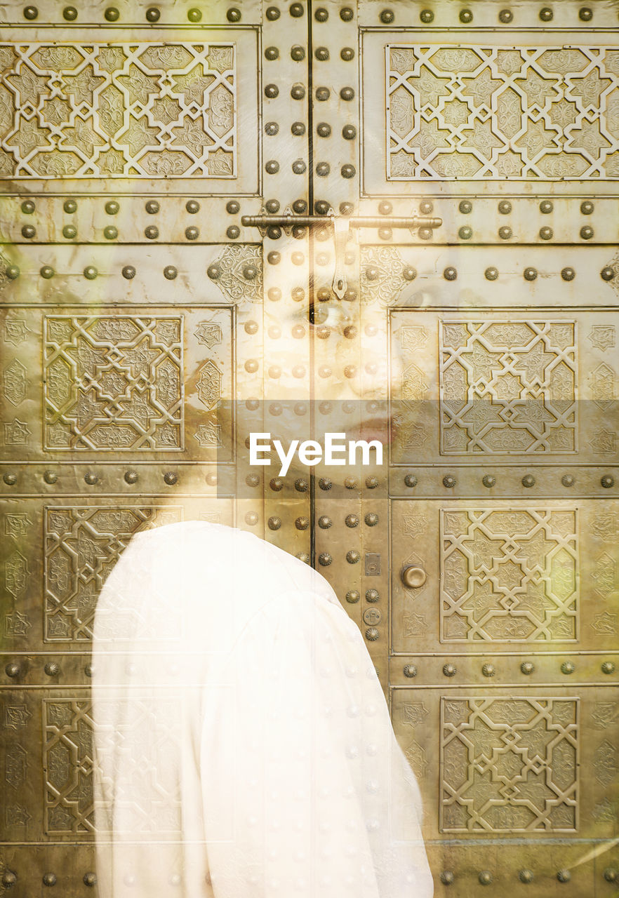 wall, pattern, indoors, architecture, one person, wall - building feature, religion, ancient history