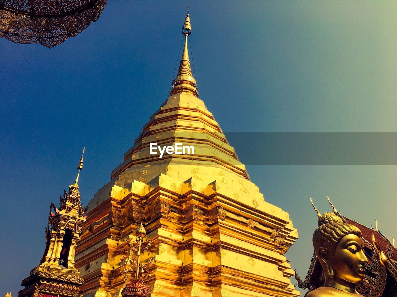 LOW ANGLE VIEW OF TEMPLE AGAINST CLEAR SKY