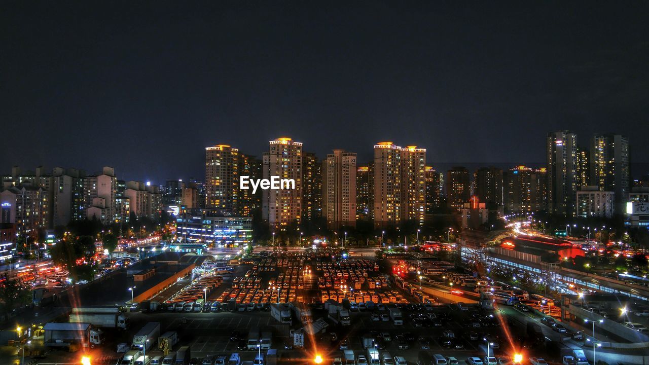 Illuminated cityscape at night