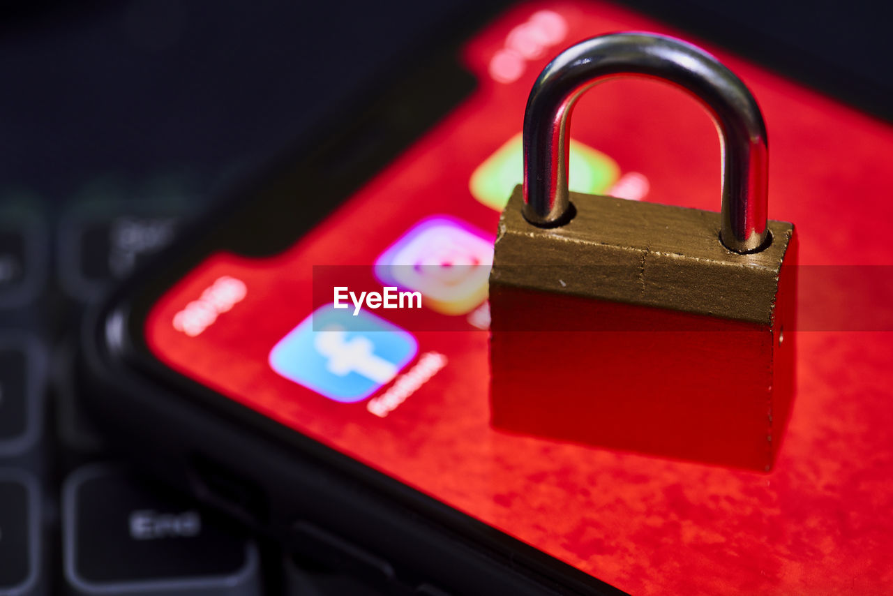 close-up of padlock on metal