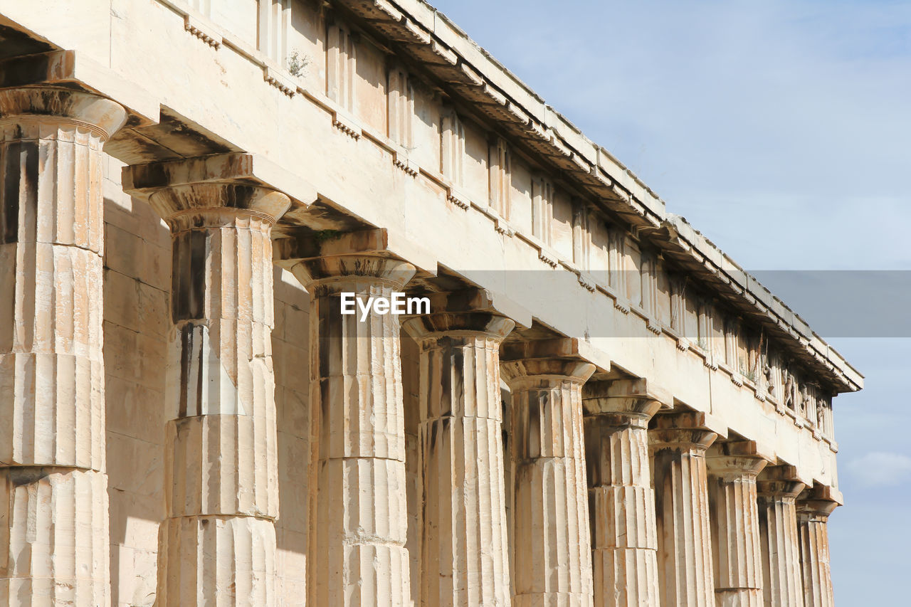 Low angle view of pillars collonade on ancient greek temple