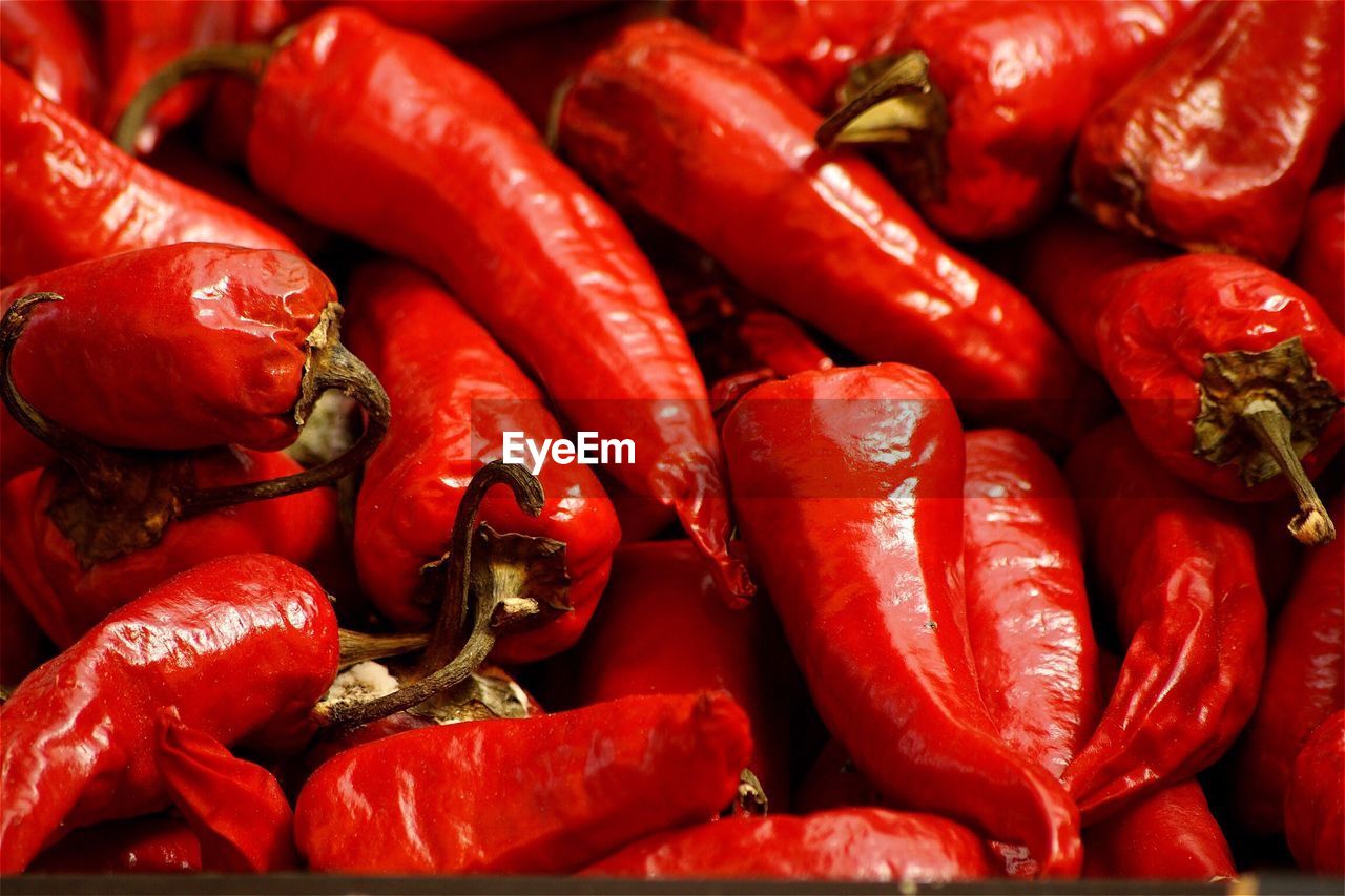 Full frame shot of red chili peppers for sale at market stall