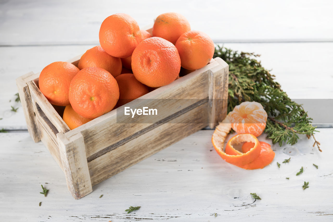 high angle view of fruits in basket on table