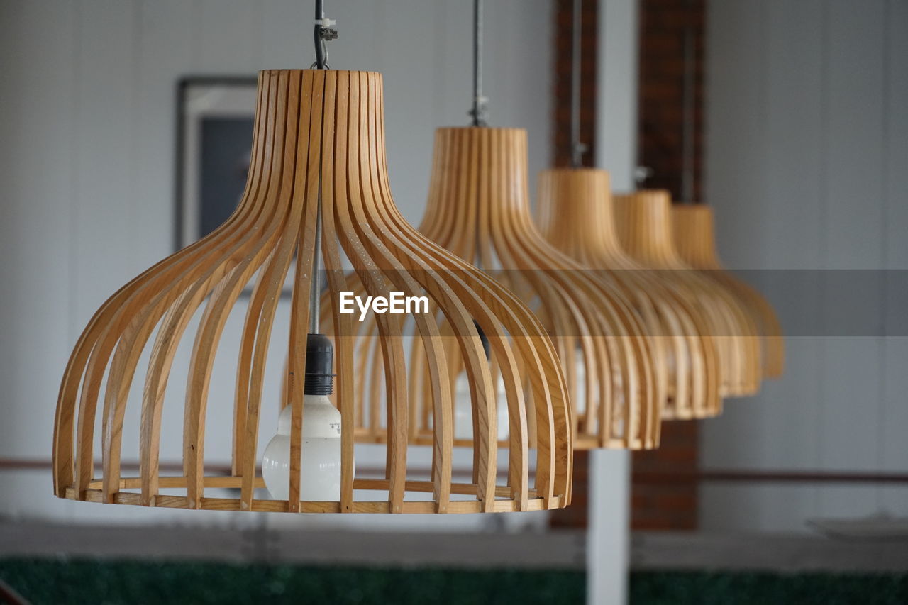 Close-up of pendant lights hanging at home