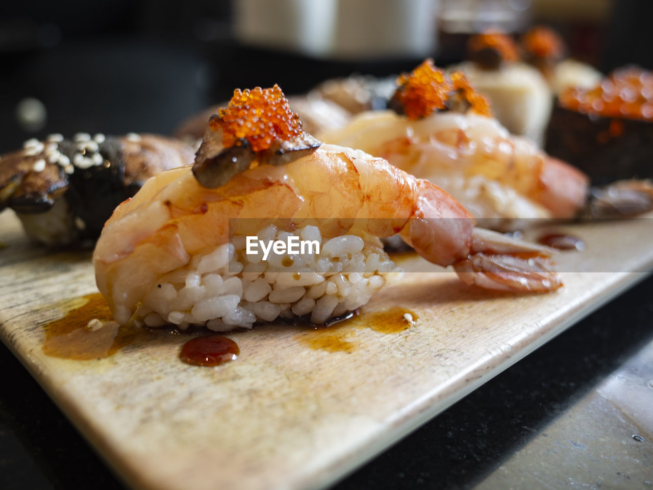 CLOSE-UP OF SUSHI SERVED ON PLATE