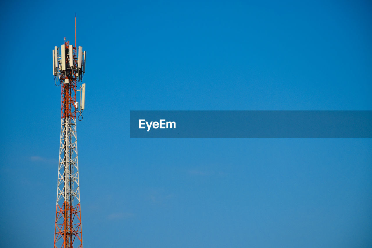 sky, blue, copy space, communications tower, technology, broadcasting, clear sky, low angle view, nature, tower, architecture, built structure, communication, no people, metal, global communications, day, sunny, outdoors, antenna, wireless technology, telecommunications engineering, industry, mast, telecommunications equipment