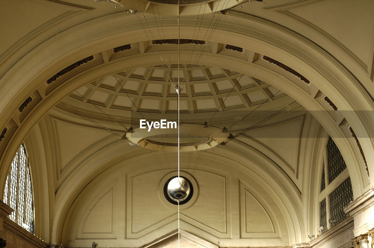 LOW ANGLE VIEW OF CHURCH INTERIOR