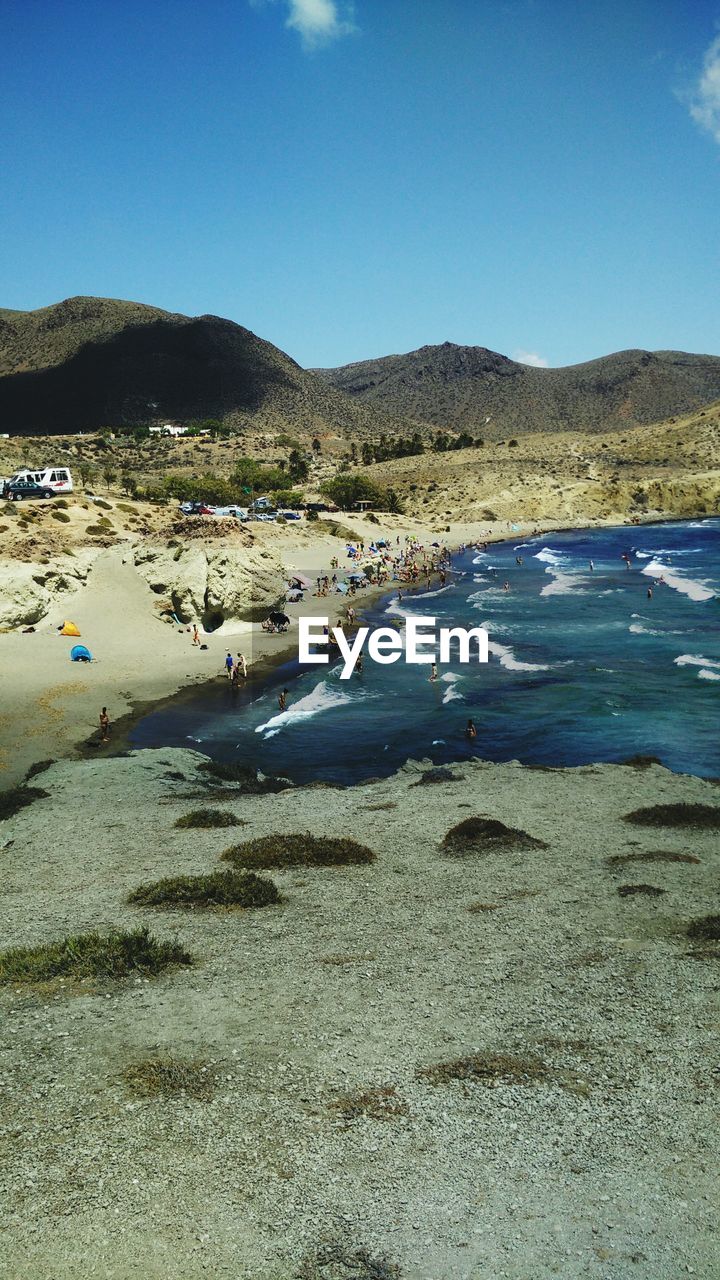 Scenic view of lake against blue sky