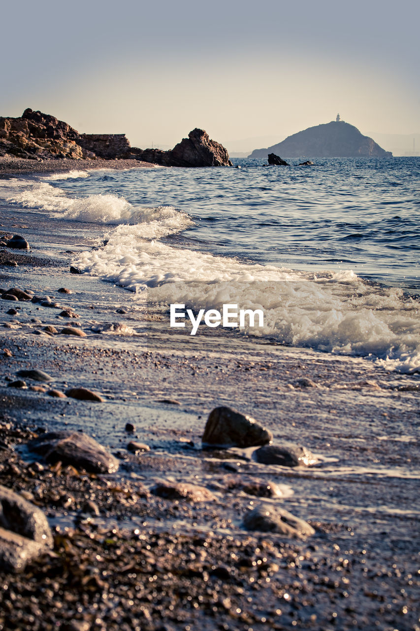 Scenic view of sea against clear sky