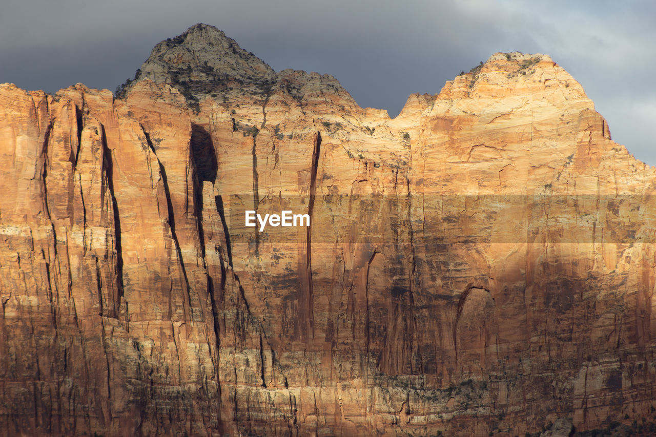 Scenic view of rock formations against sky