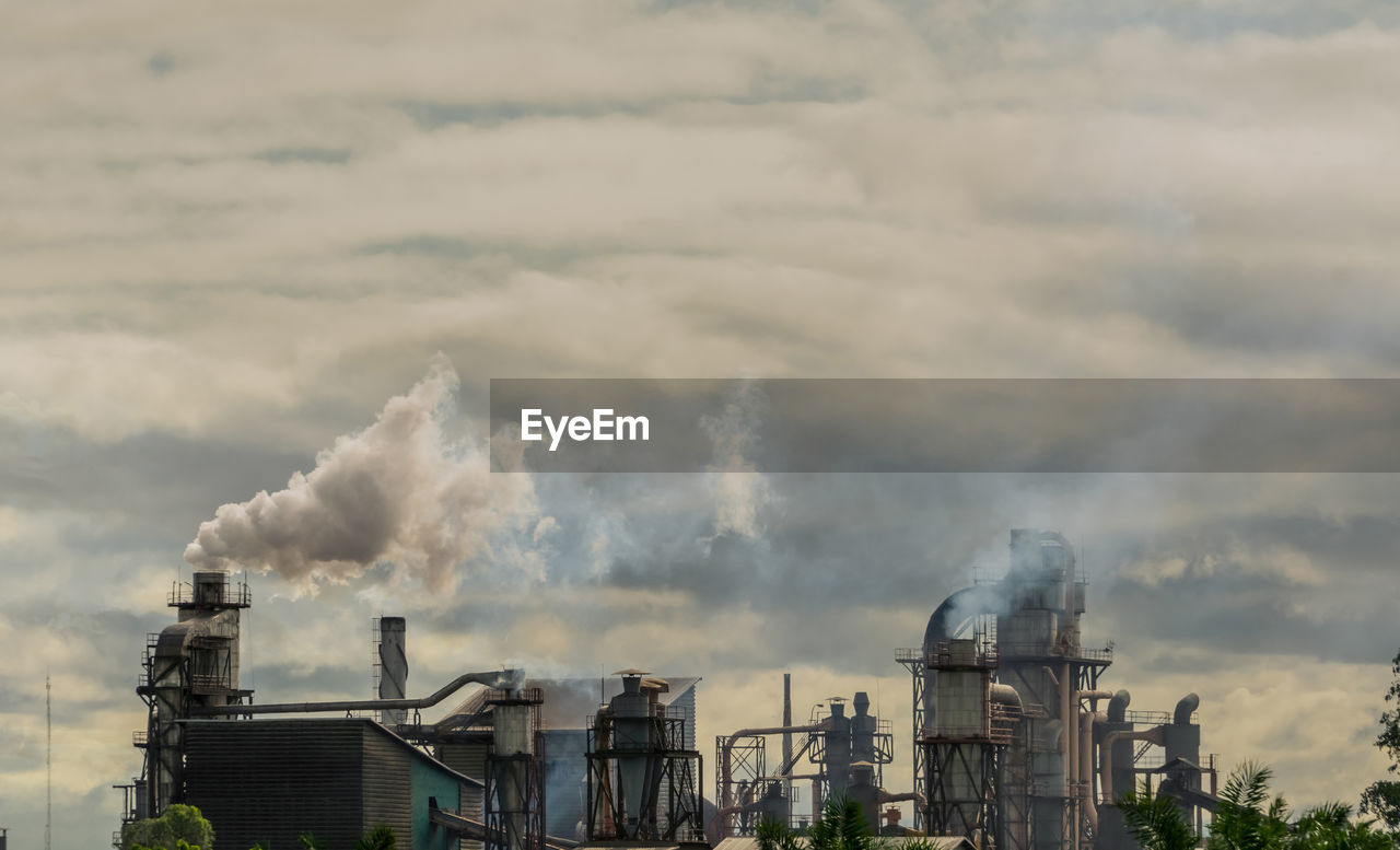 Co2 emissions. co2 greenhouse gas emissions from factory chimneys. carbon dioxide gas air pollition