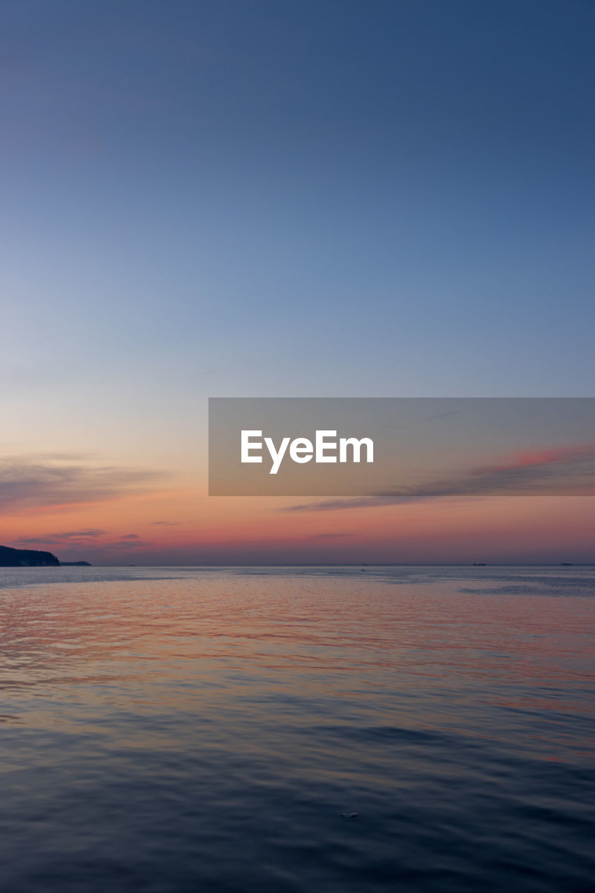 SCENIC VIEW OF SEA DURING SUNSET