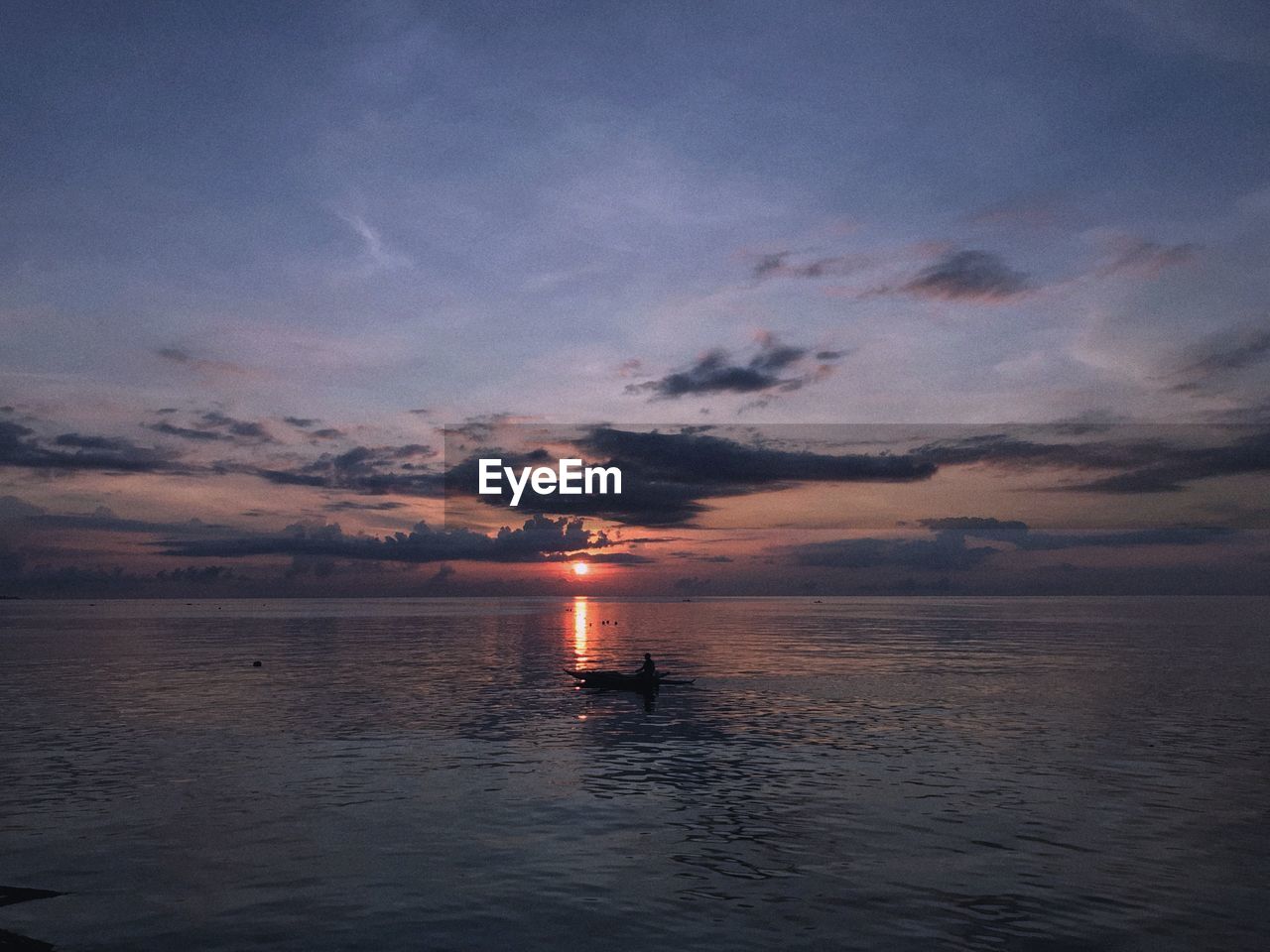 SCENIC VIEW OF SEA DURING SUNSET