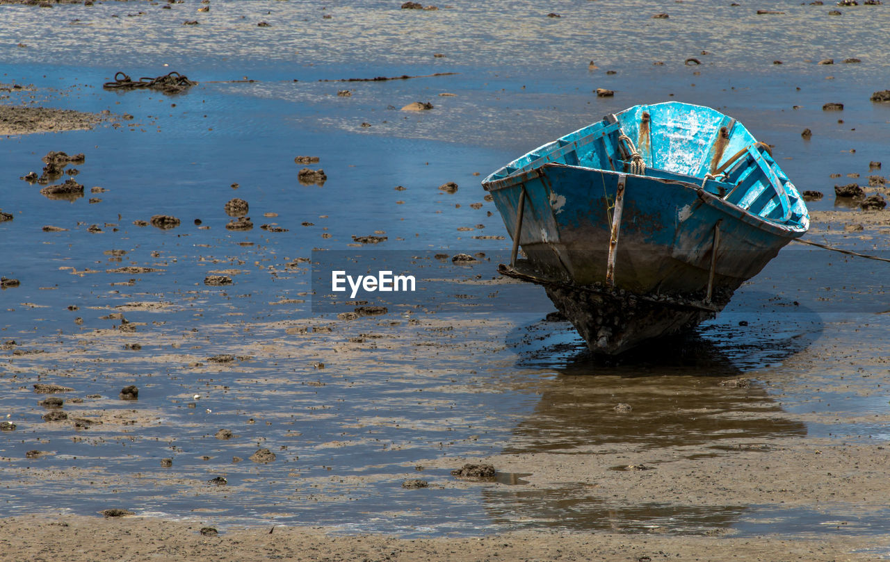 Wooden boat fisherman on blue sea, lifestyles local fisherman in chonburi