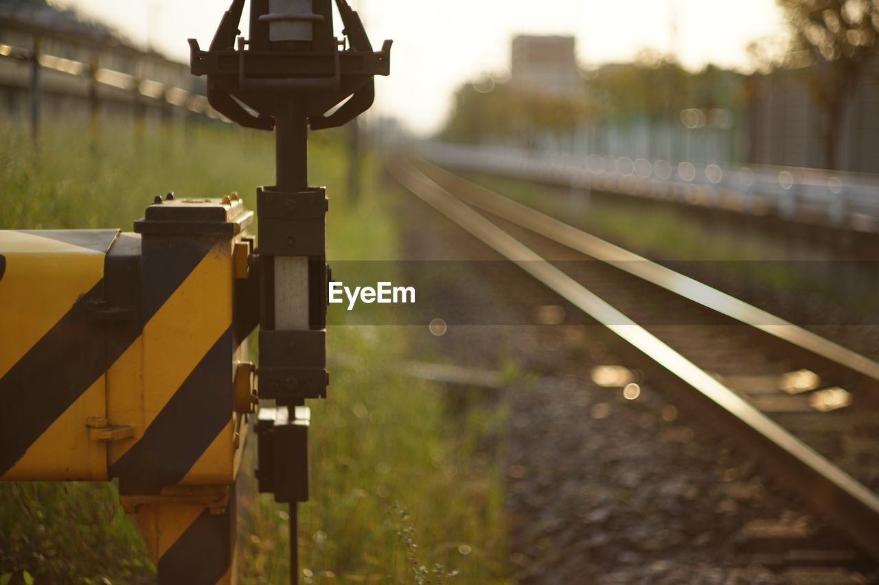 Close-up of railway control by tracks