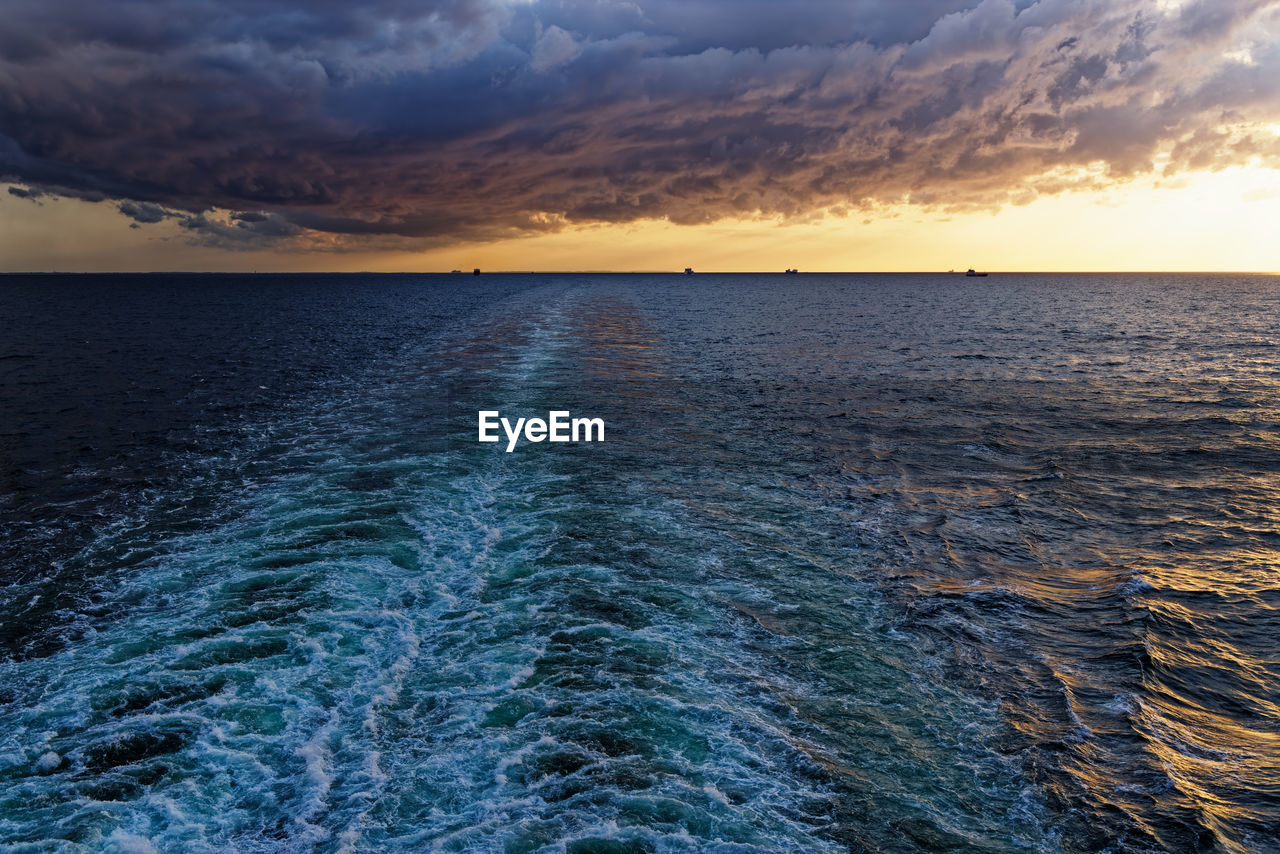 Scenic view of sea against sky during sunset