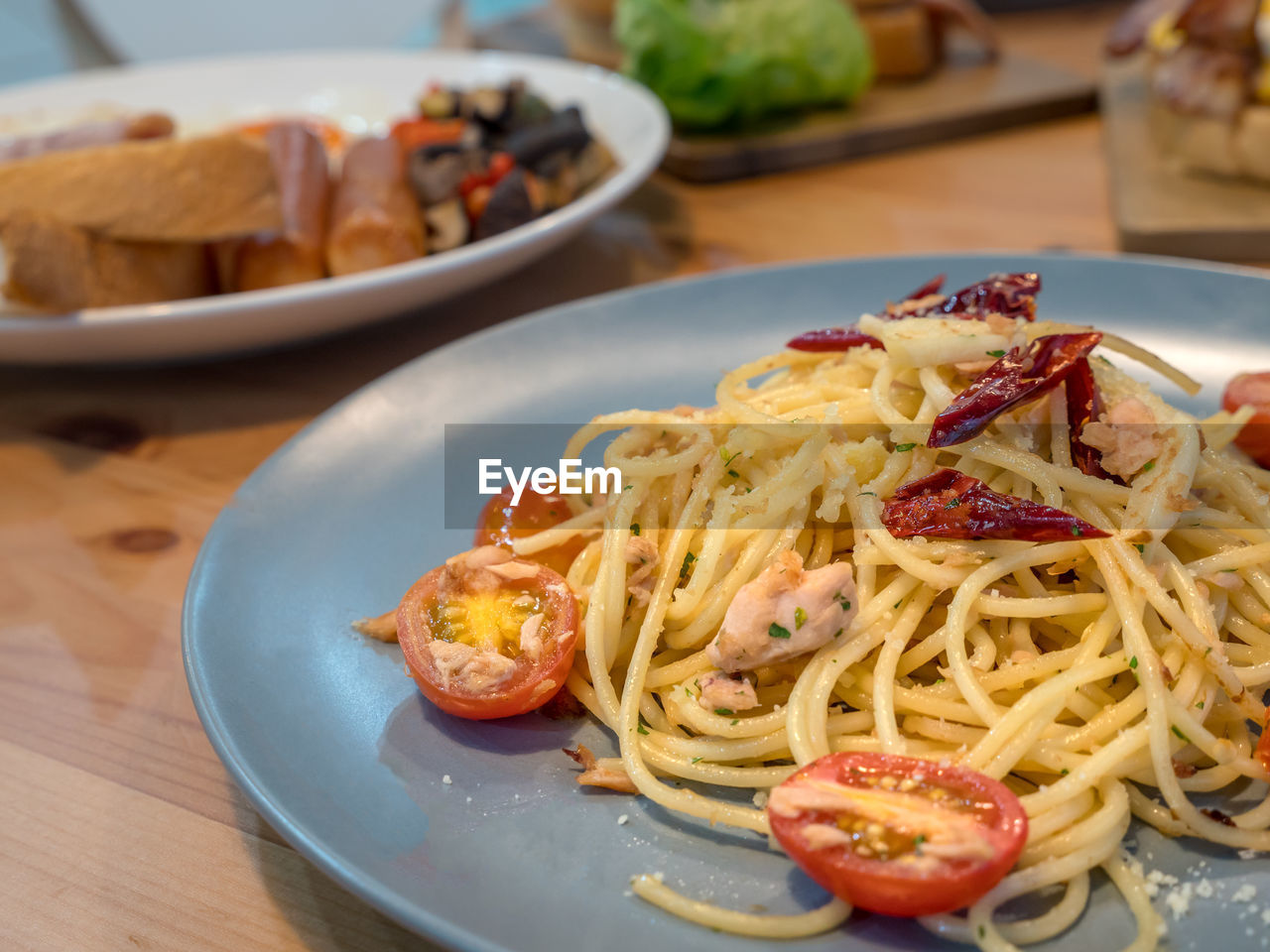 CLOSE-UP OF NOODLES SERVED IN PLATE