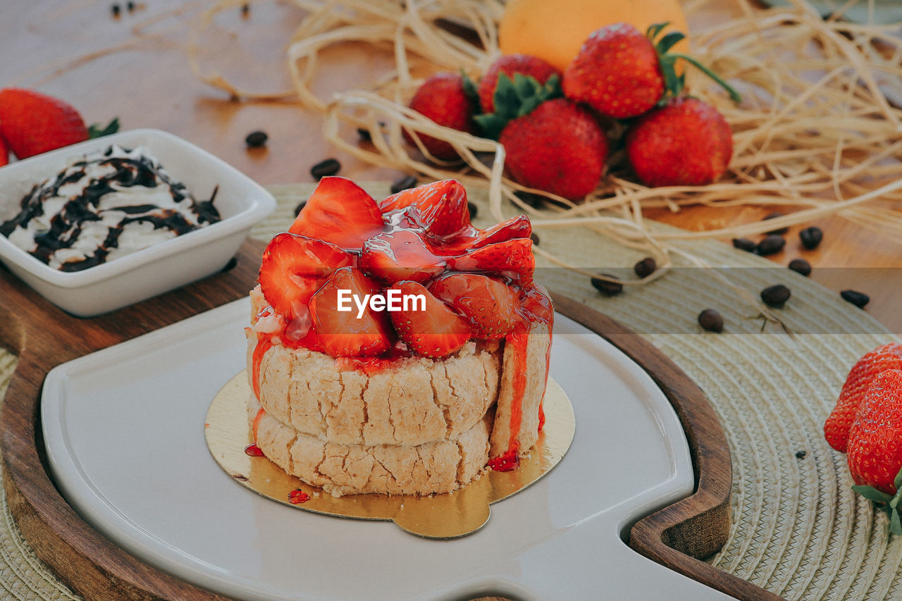 High angle view of strawberries in plate on table