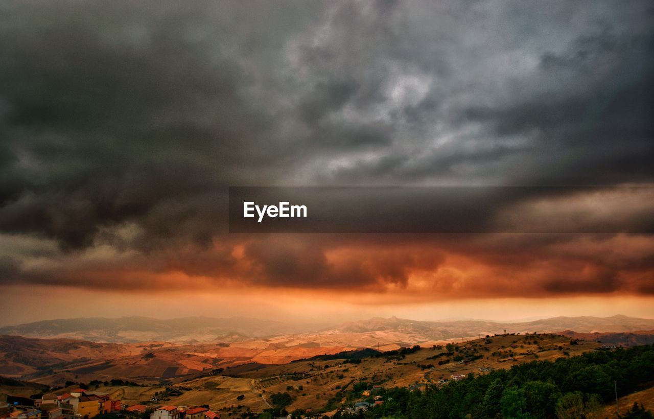 DRAMATIC SKY OVER LANDSCAPE