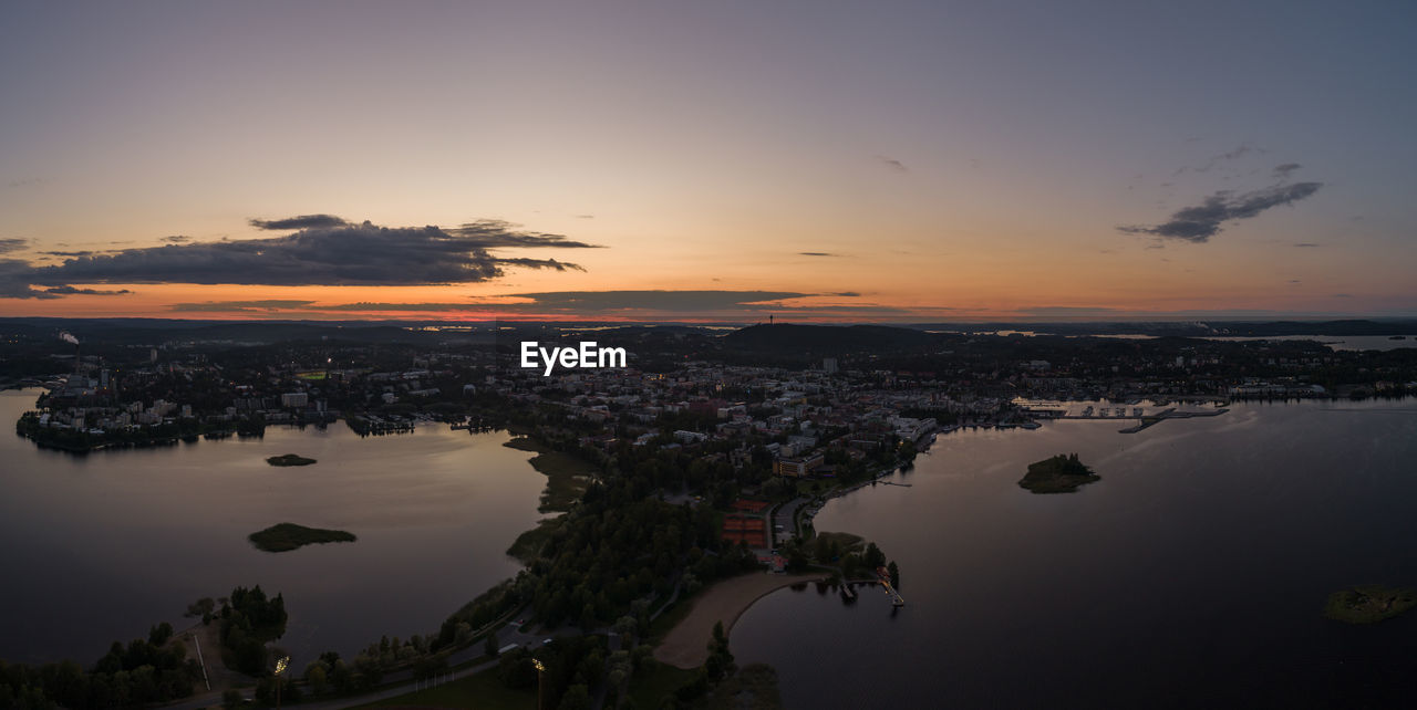 AERIAL VIEW OF CITY DURING SUNSET