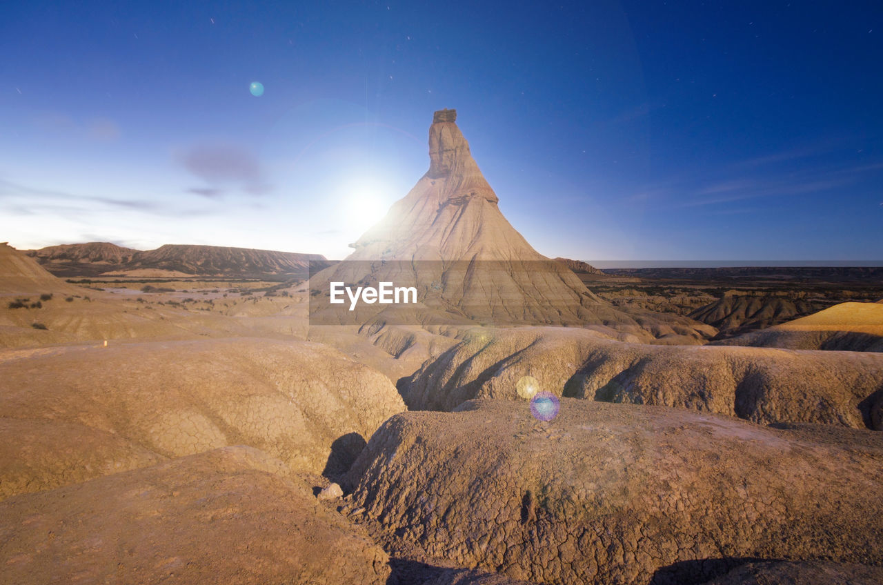 Scenic view of desert against sky