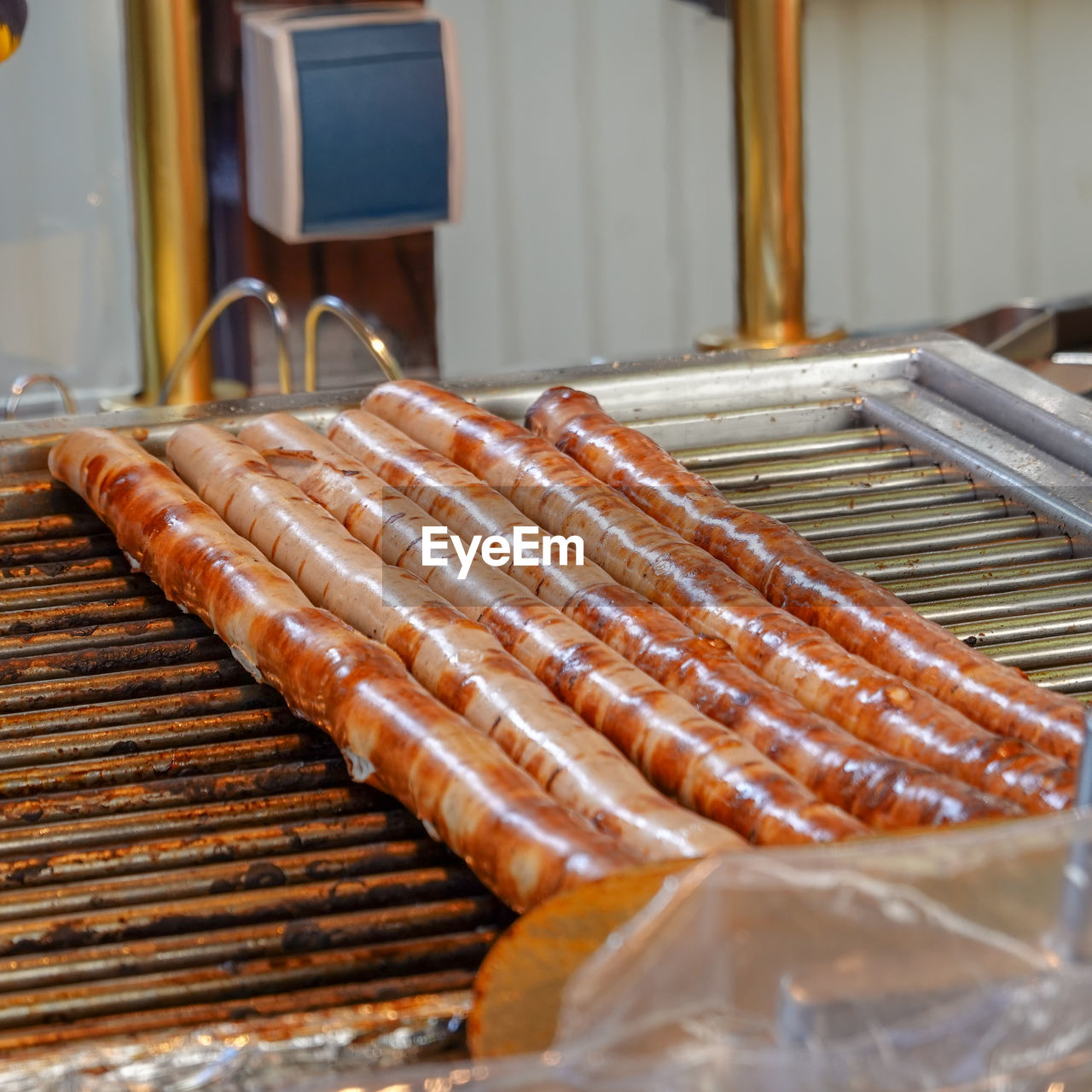 Huge sausages with a length of more than half a meter on the grill at a street festival in germany