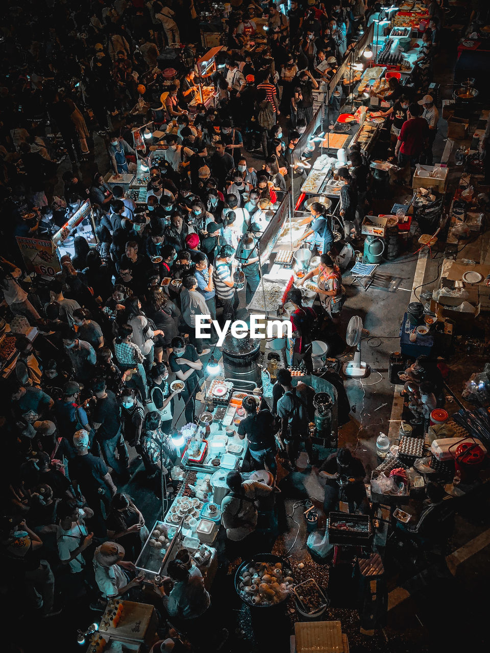 High angle view of people on street in city