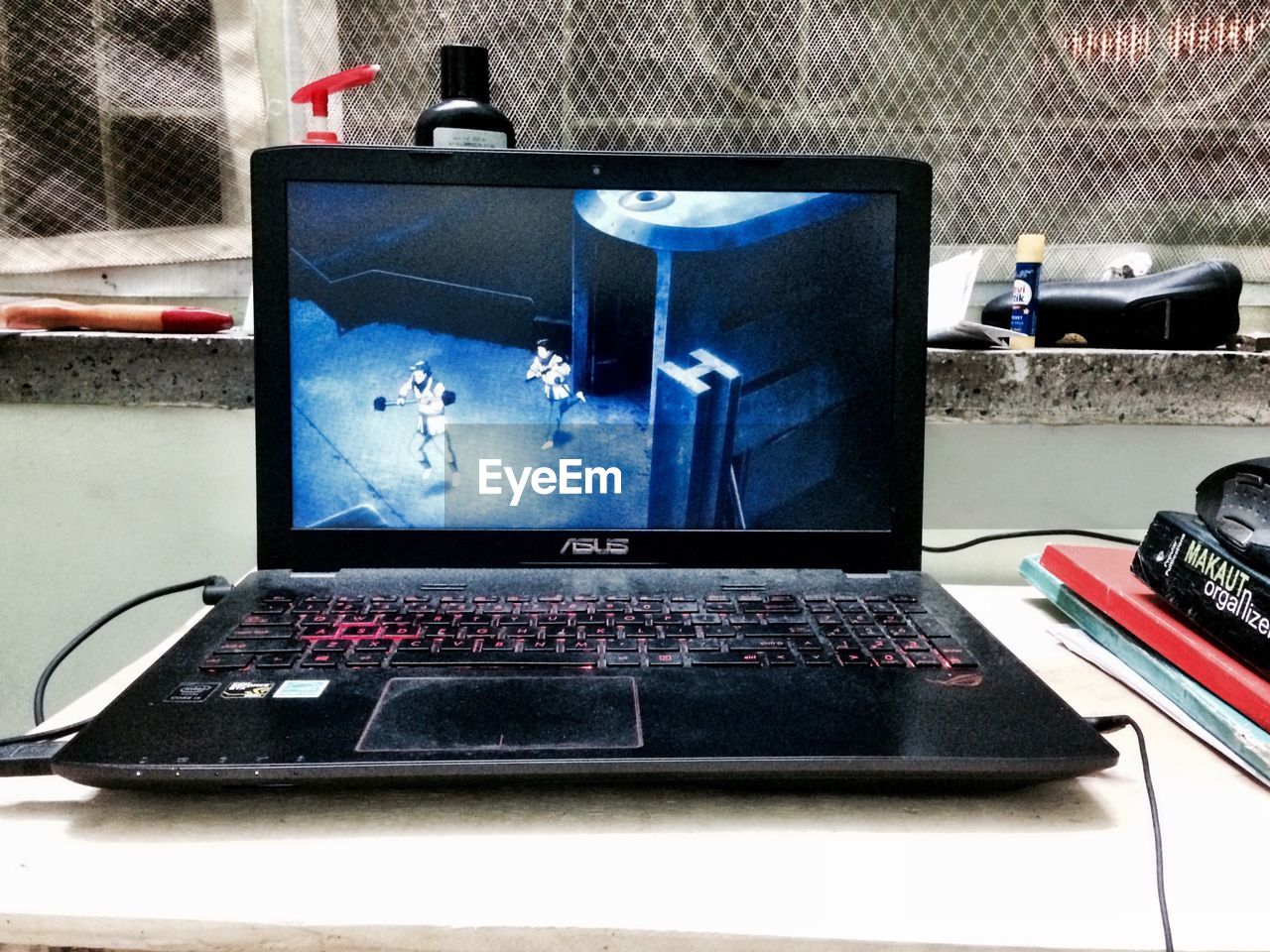 CLOSE-UP OF COMPUTER KEYBOARD ON TABLE