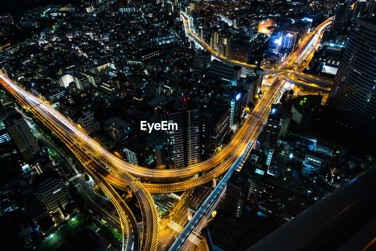 High angle view of light trails on street in city